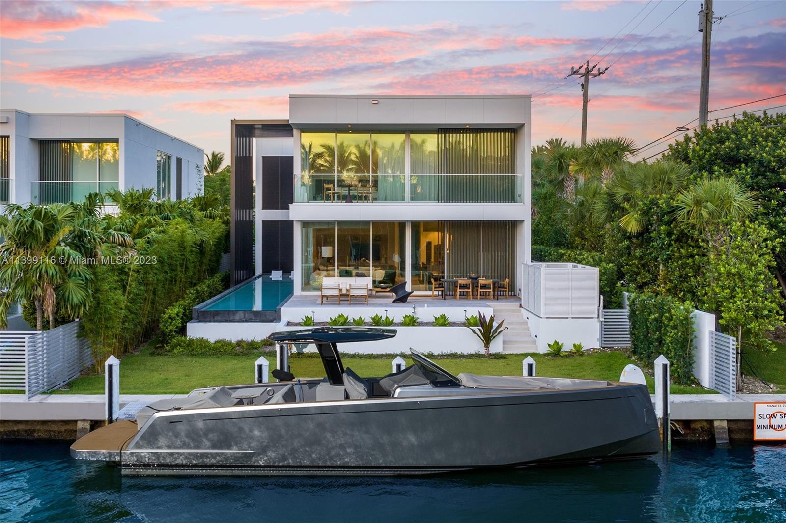 Experience the ultimate waterfront luxury at the Ritz Carlton Residences in Miami Beach. This exclusive two-story villa, crafted by the renowned Piero Lissoni, seamlessly combines the allure of a luxury hotel with the charm of modern tropical living. Its contemporary design features Georgette Select Limestone floors, wood floors, Boffi cabinetry, Gaggenau appliances, Ipe hardwood decking, Fantini faucets, and a gas generator. Nestled alongside Surprise Lake and offering access from your private dock to Biscayne Bay, the Intracoastal Waterway, and the Atlantic Ocean, this residence presents an ideal retreat that harmonizes the best of both worlds, the privacy and independence of your sanctuary while relishing in the world-class amenities and impeccable services provided by The Ritz-Carlton.