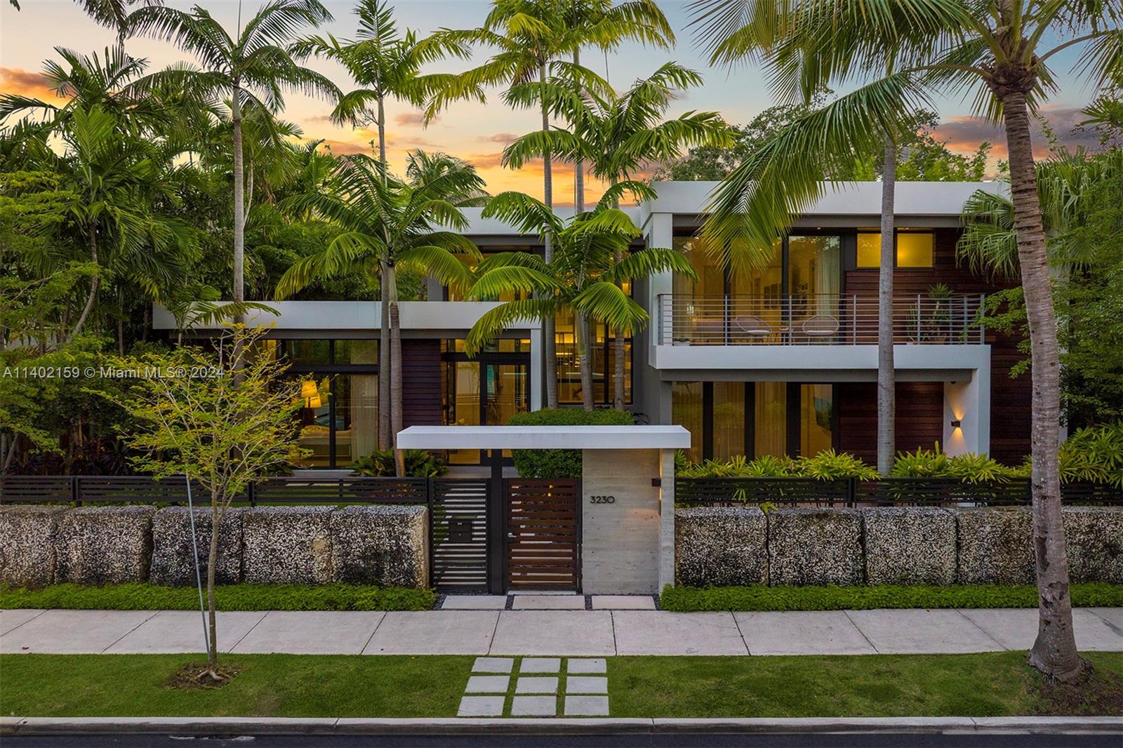 Indulge in the ultimate Coconut Grove lifestyle in this extraordinary modern estate by renowned architect Charles Treister. Perched atop a ridge 21 ft above sea level and surrounded by a lush garden, this unique Tri-Level home seamlessly blends indoor and outdoor spaces for a tranquil tropical experience. Boasting an array of meticulous details and exquisite craftsmanship, you'll be captivated by a spectacular floorplan with 7 bedrooms and 7/2 bathrooms, rare to find basement w/ A/C, separate guest suite apartment, elevator, and exquisite finishes throughout. Experience an outdoor oasis with glowing pool & spa, covered terrace, summer kitchen and outdoor shower. This modern smart home offers it all with a full house generator, 2 car garage in desirable North Grove and prestigious schools.