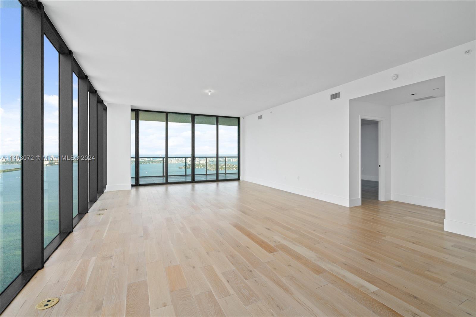 East facing Living and Dinning Room over Biscayne Bay