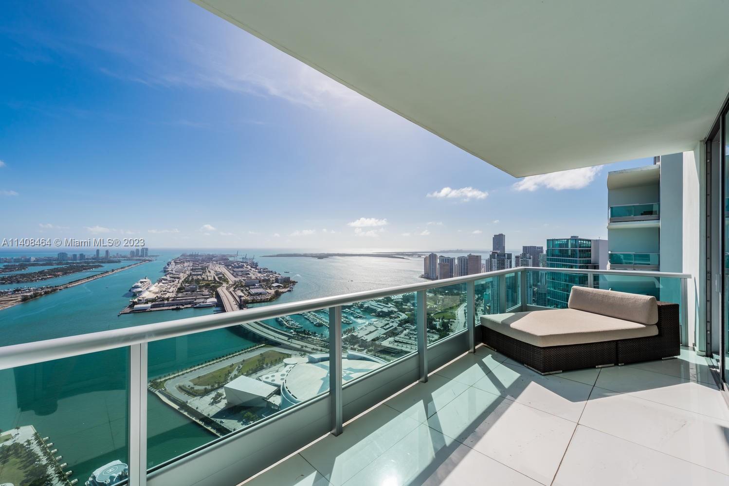 Spectacular Penthouse unit at 900 Biscayne. Feel on top of the world with Unobstructed Ocean and City Views, Deep Balconies offer authentic inside-outside living. Features include a Private Elevator, foyer, Art, white glass floors, custom wood paneling, custom wood doors, modern furniture, LED wall-mounted TVs, and 1parking space.  All the luxury of a high-end building with 5-star amenities including a SPA, state-of-the-art fitness center, theater, billiard room, lounge, business center, lounge pool, lap pool, sauna, steam room, 24-hour concierge service Excellent location in Downtown Miami, near Restaurants, Parks, Miami Beach, Brickell, Museums, Art Center, and Miami Int’l Airport. Easy access to I-95.