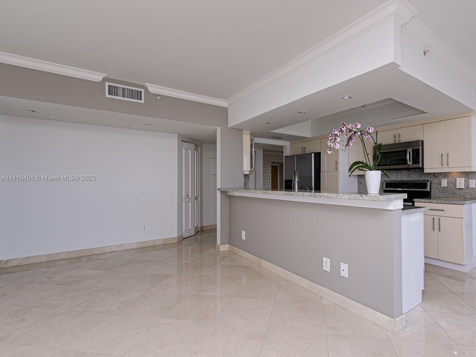 OPEN CONCEPT KITCHEN AND DEN