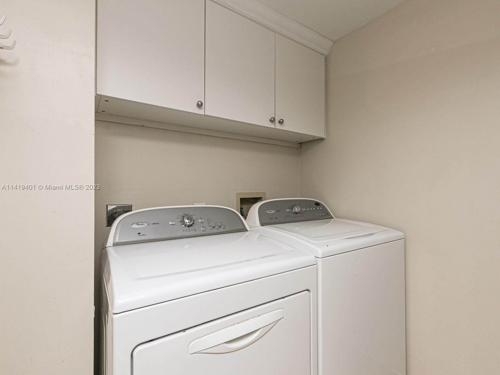 LAUNDRY ROOM WITH FULL SIZE WASHER/DRYER