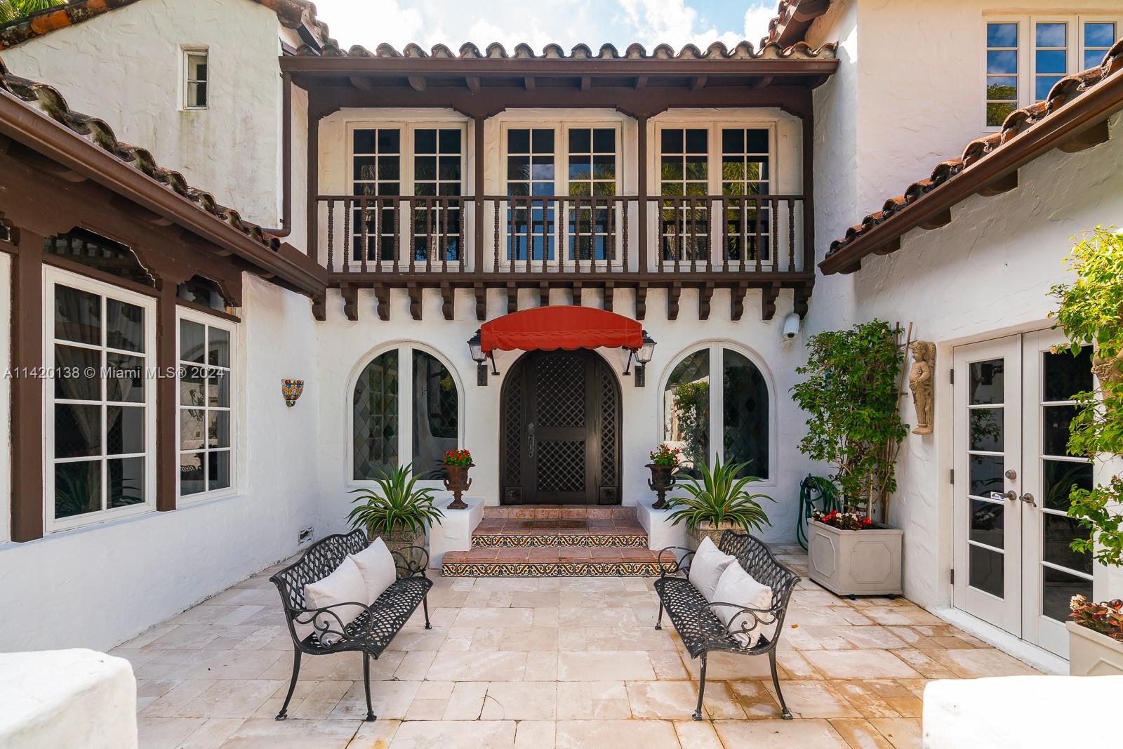 1920's Old Spanish style villa with 6397 actual square feet (5044 living area) on a 15,750 sq ft lot steps from the Biltmore Hotel & Golf Course, Salvadore Park and the Venetian Pool. Classical architecture with loggia, Palladian window frames, high timber-beamed ceiling in the main living room & sun-dappled courtyards with flowing fountains. There are 6 bedrooms and 6.5 bathrooms. The primary bedroom suite & 3 other bedrooms are upstairs.  Guest bedroom and a maid's bedroom on the 1st floor. Summer kitchen, large library & office by the heated pool. The home is walled and gated and within walking distance to many Coral Gables landmark destinations and to Downtown Coral Gables. 2-car garage, impact doors & windows. Also available for annual lease at $29,000 a month or $39,000 furnished