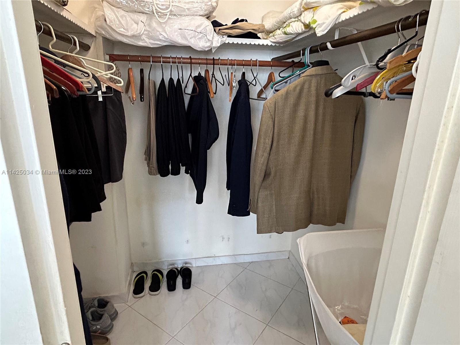 MASTER BEDROOM WALK IN CLOSETS