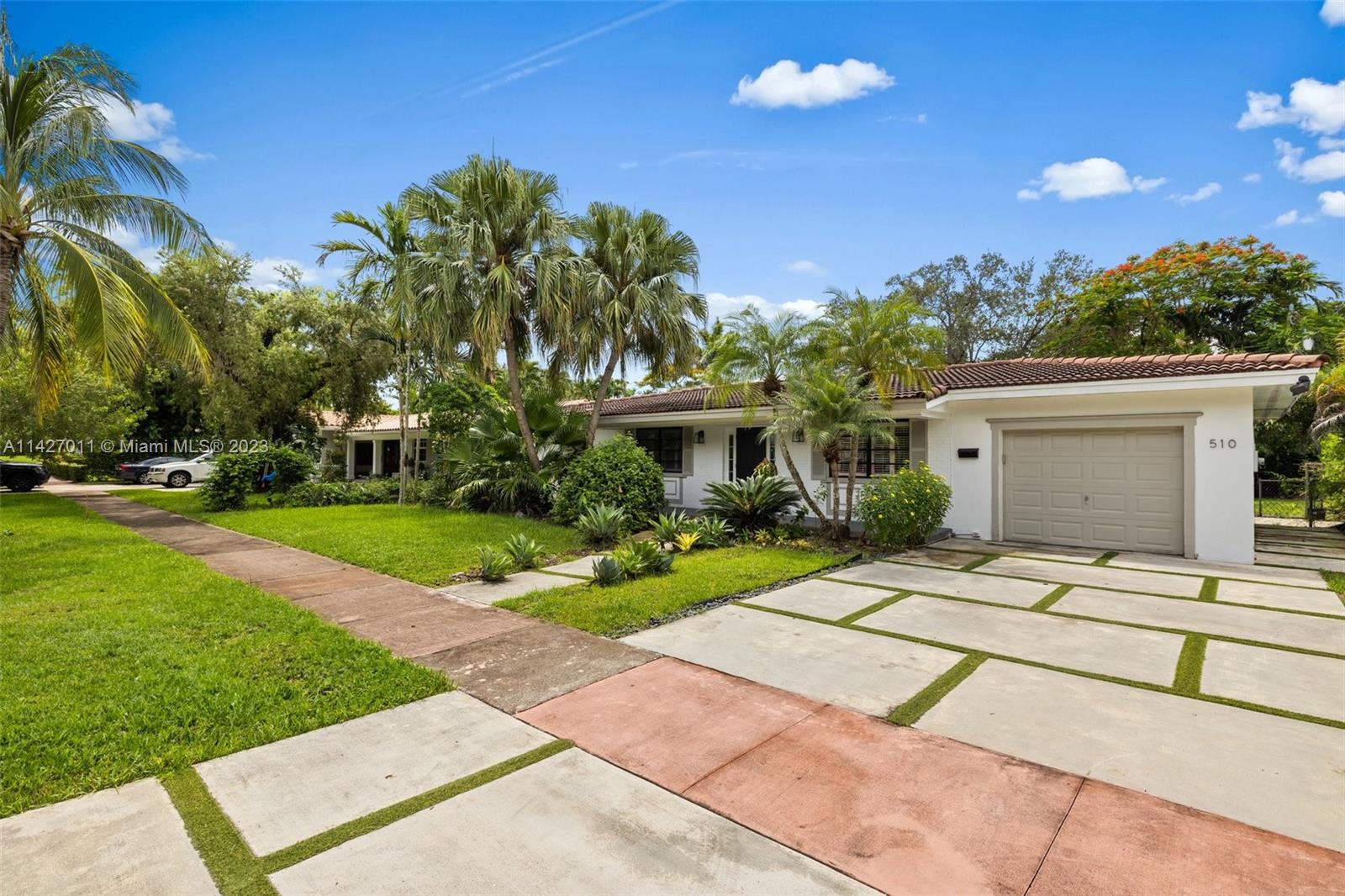 Welcome to your dream home in Coral Gables, "the city beautiful". This light-filled house offers 4 large bedrooms & 3 bathrooms, with 2,585 sqft of living area. Step inside to discover beautiful ceramic floors throughout. The elegant kitchen is equipped with stainless steel appliances, while the modern bathrooms add a touch of luxury. A single-car garage ensures convenience. The covered terrace with A/C and bar provides an ideal space for entertaining. Embrace the South Florida lifestyle with your own swimming pool and expansive lush garden on this generous lot. The sought-after location offers proximity to the University of Miami, Merrick Park, Coco Walk, and easy access to US 1. Don't miss the opportunity to make this remarkable property your forever home!