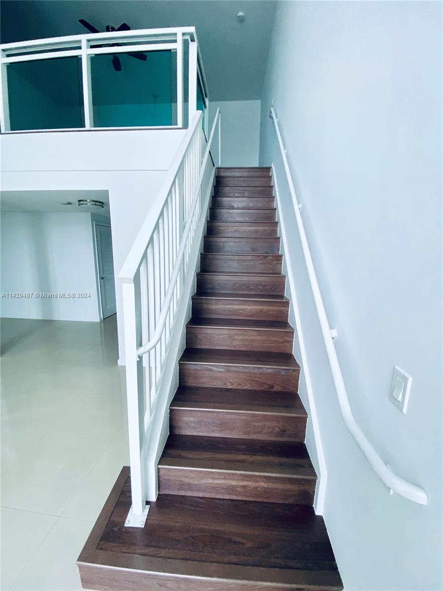 Stairs leading to Open Loft Style master bedroom