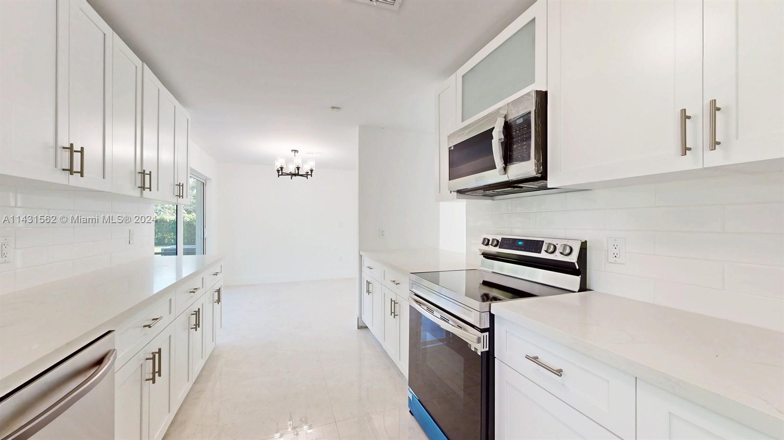 Crisp, clean and and fully tiled back-splash.