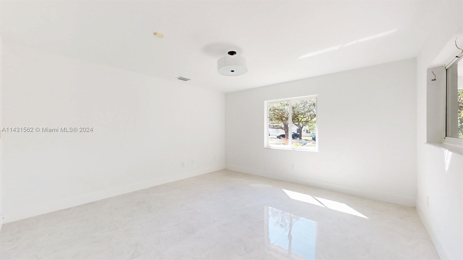 SW Bedroom #2 with a window facing the South and West.