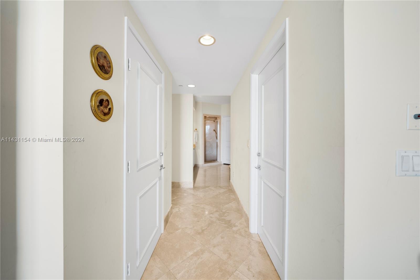 Hallway leading to Master Bedroom with two walking closets