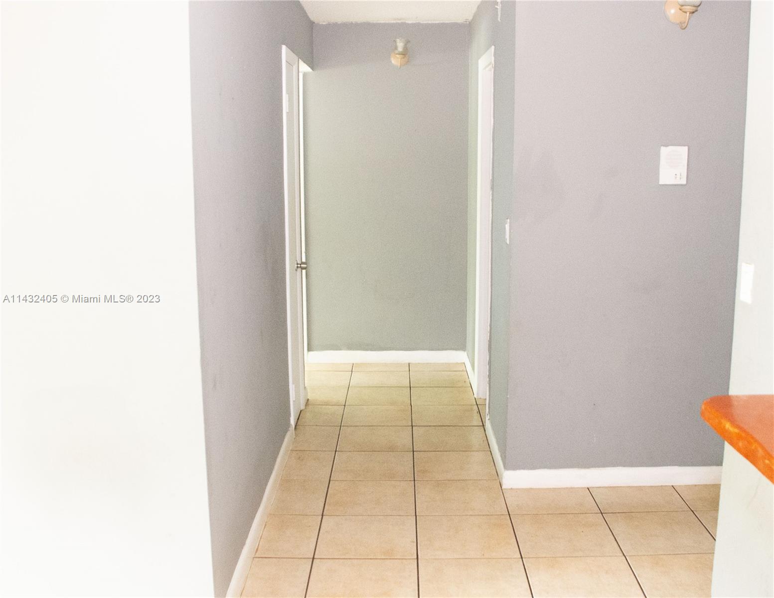 Hallway from Living to Guest Bathroom and Bedrooms.