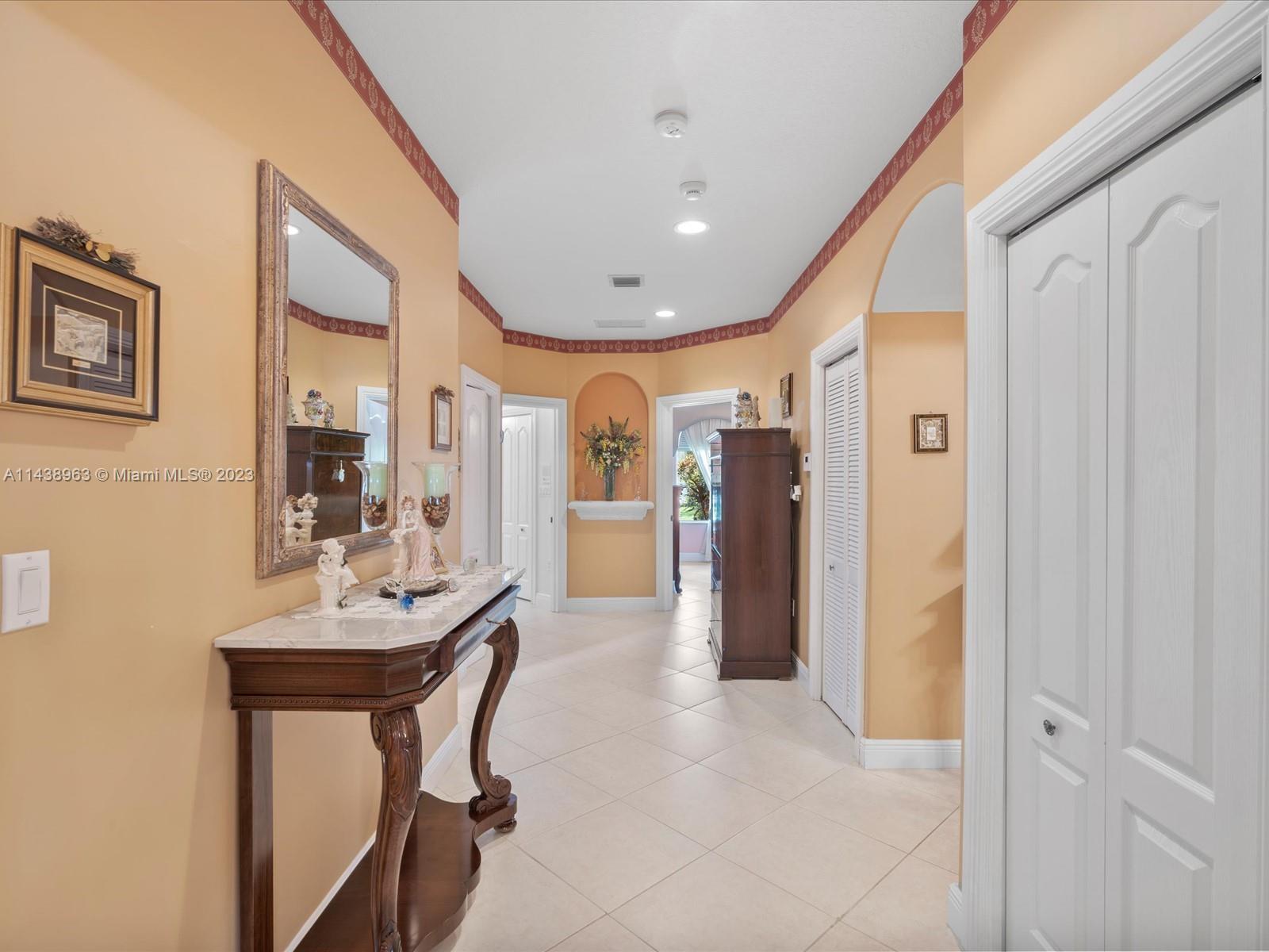 Corridor as you're exiting past the double doors of the Primary  Bedroom.