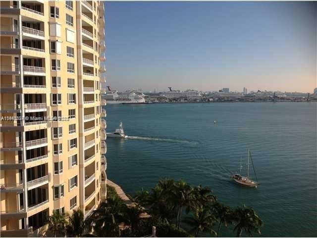 Island living at its best! Beautiful views of Biscayne Bay, pool and gardens. Tile floors throughout. Updated open kitchen with SS Appliances and wood cabinets. Half bath converted into a closet. Amenities include saltwater pool, gym, sauna, tennis, racquetball, convenience store at lobby level, 24hr concierge and valet parking. Minutes to best restaurants and shopping and entertainment.