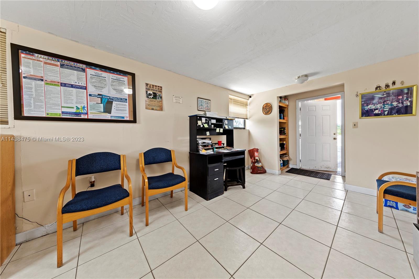 Bldg #1 ENTRY OFF CARPORT STAIRS LEAD TO 2ND LEVEL UNUSED ALOOR