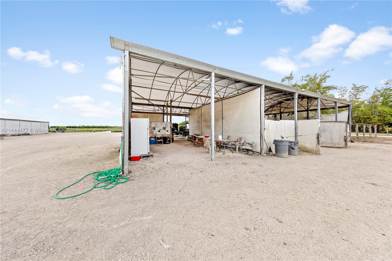 SHED/ SHIPPING CONTAINER. THIS COVERED AREA MANY EMPLOYEES PREFER TO BREAK UNDER RATHER THAN COMING UP TO SHOPS.