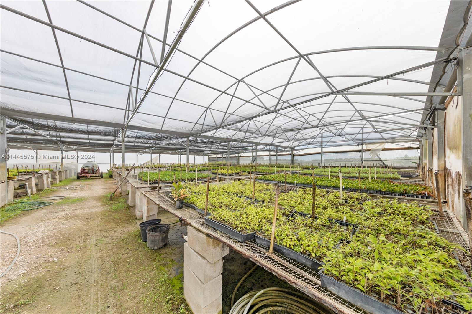  STORAGE / PARKING, 25 FOOT BEAVER TRAILRER TO HAUL NU HOLLAND OR LOAD PLANTS FOR DELIVERY (SIDE PANELS ARE REMOVEABLE)