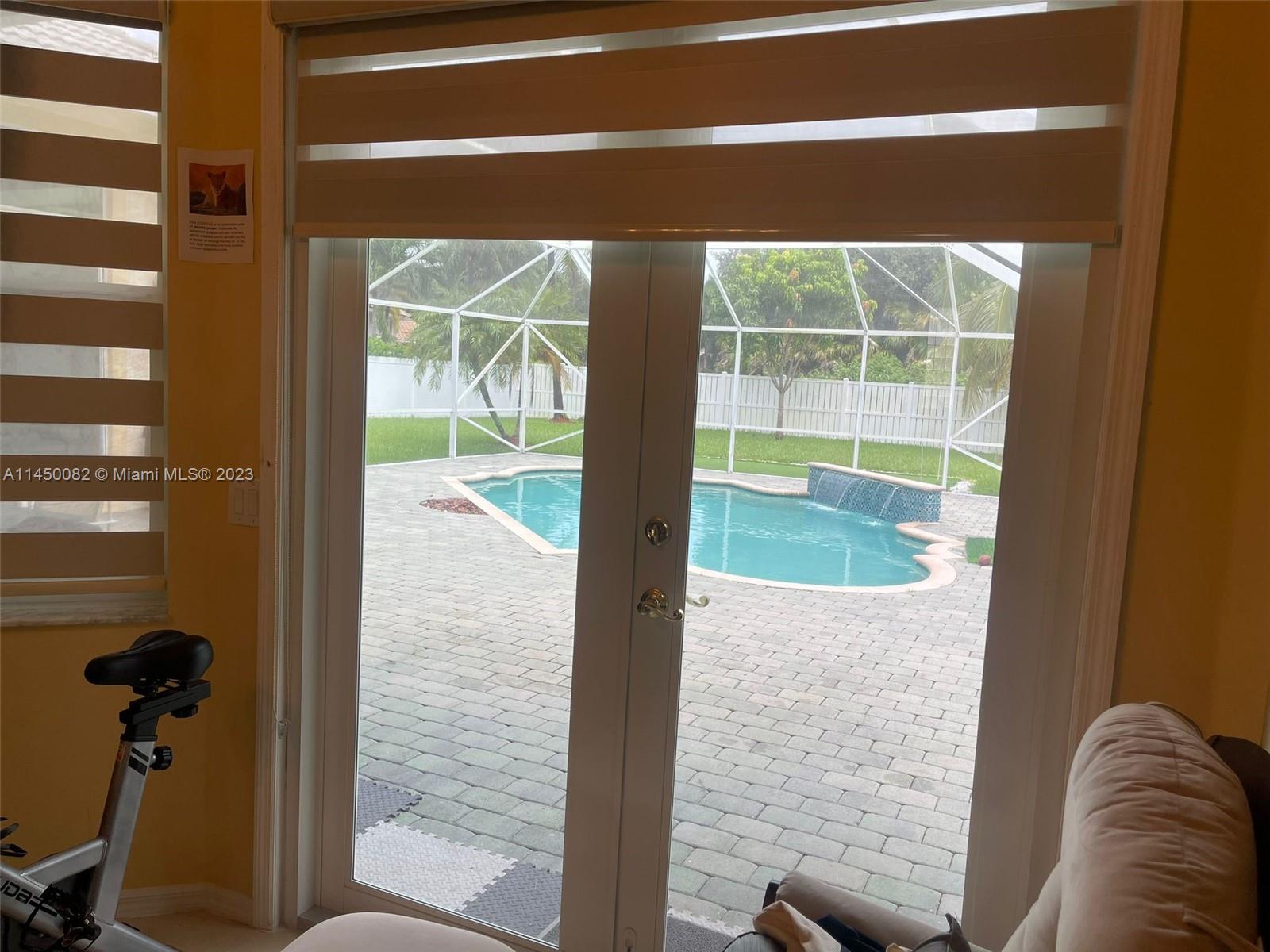 ENTRANCE TO POOL FROM MASTER BEDROOM