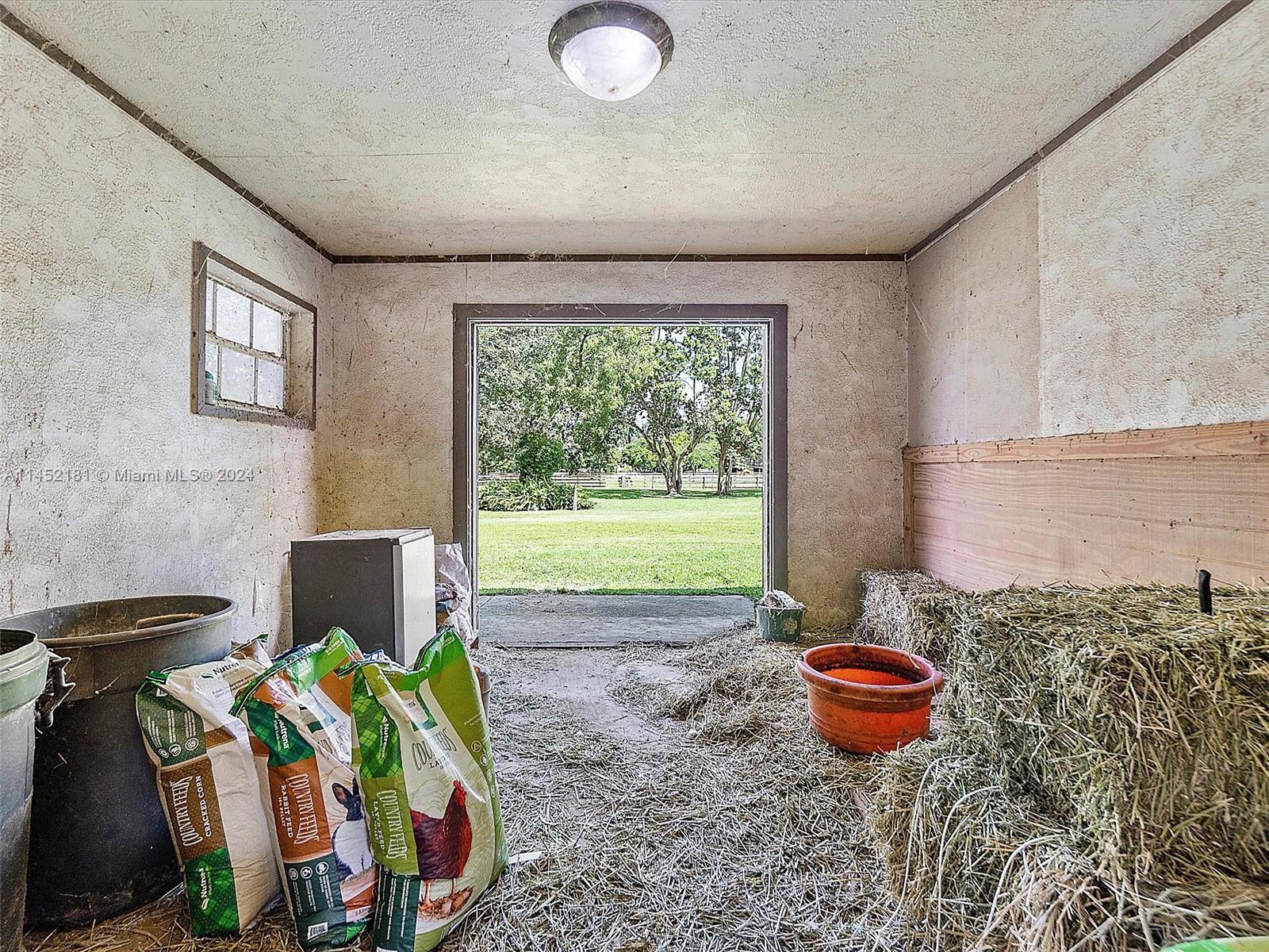 Feed room outside door for easy delivery