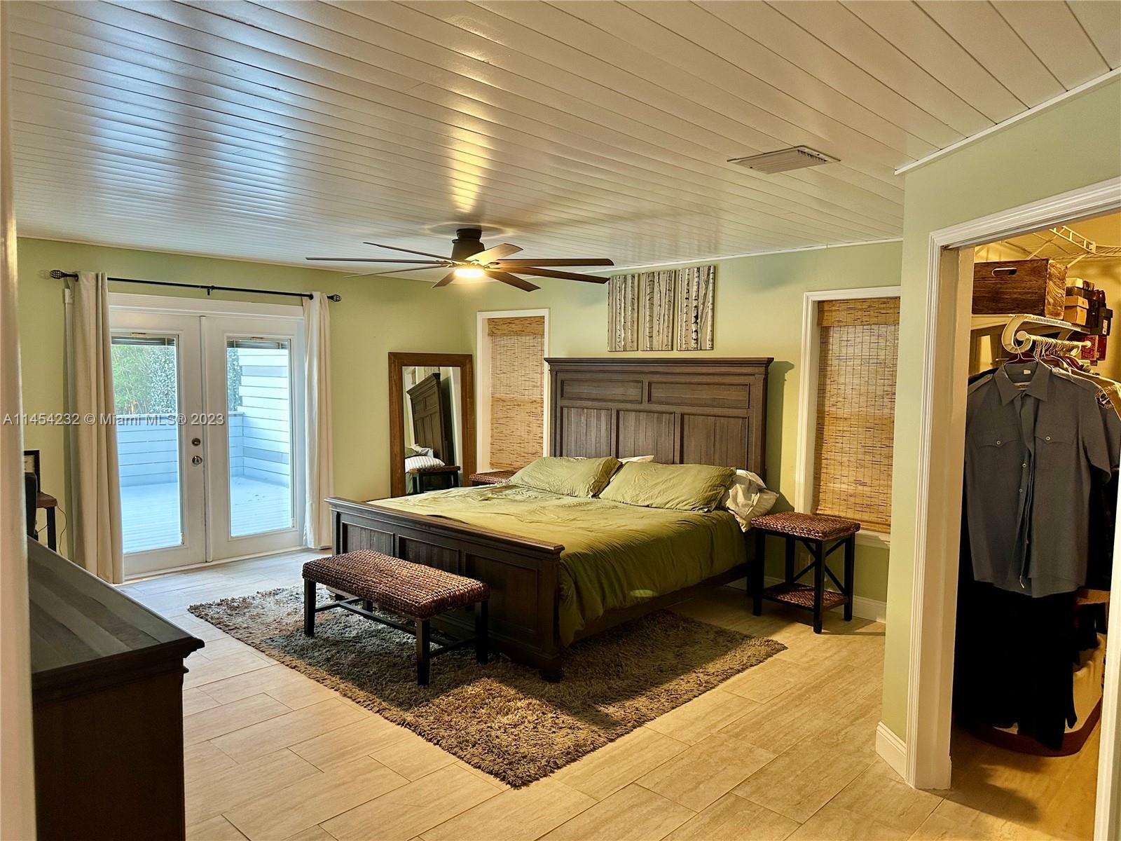 Master Bedroom leading out to patio with lake view