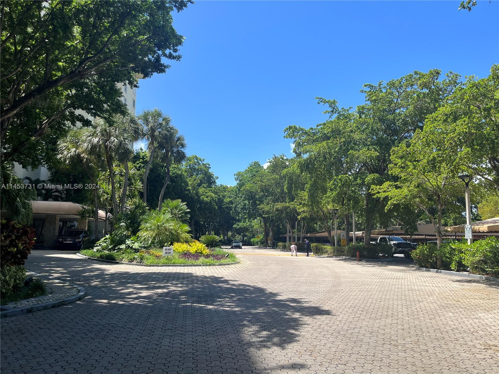 Round about, car porch dropoff entrance in front of building 2.