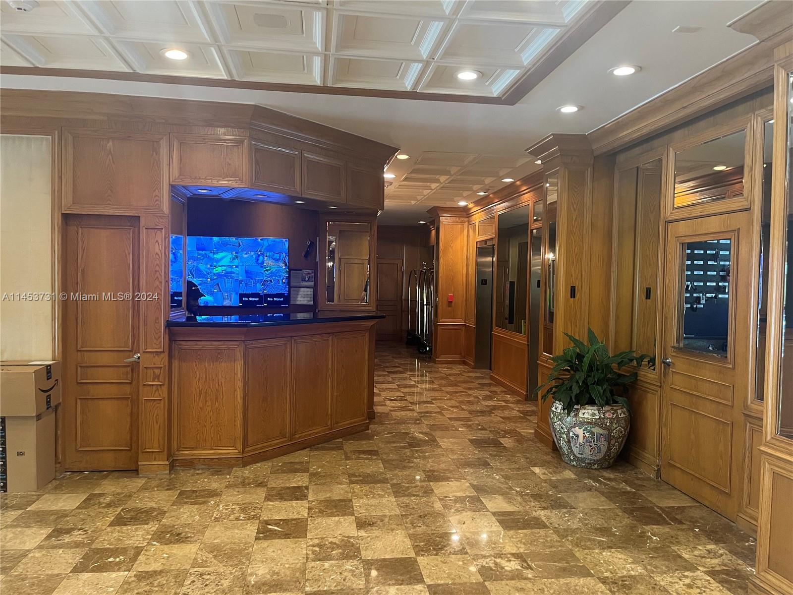 Concierge, reception desk at the Lobby - Building 2, The Jockey Club