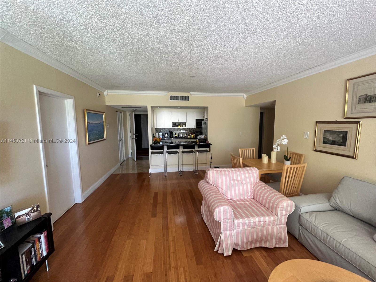 Living Room - Master apartment. Dinning area, living room and kitchen.
(Photo from balcony)