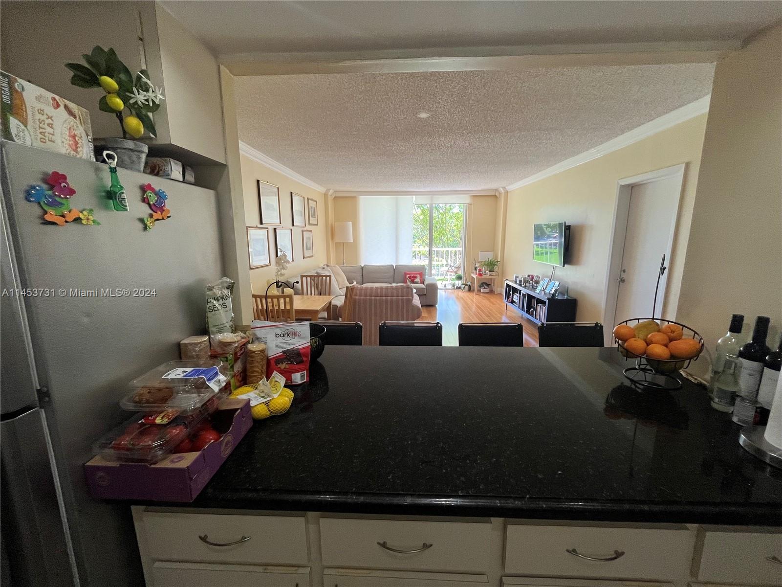 Kitchen top/ bar great for breakfast and bar with stools.