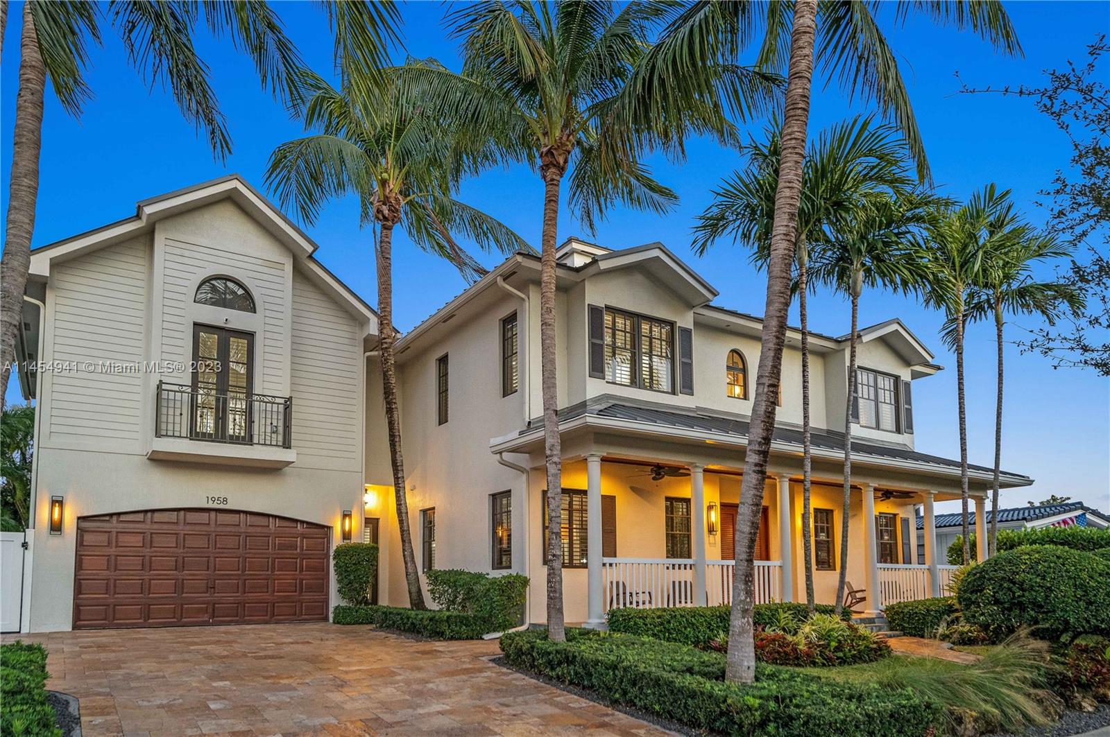 Grand entrance with tasteful landscaping