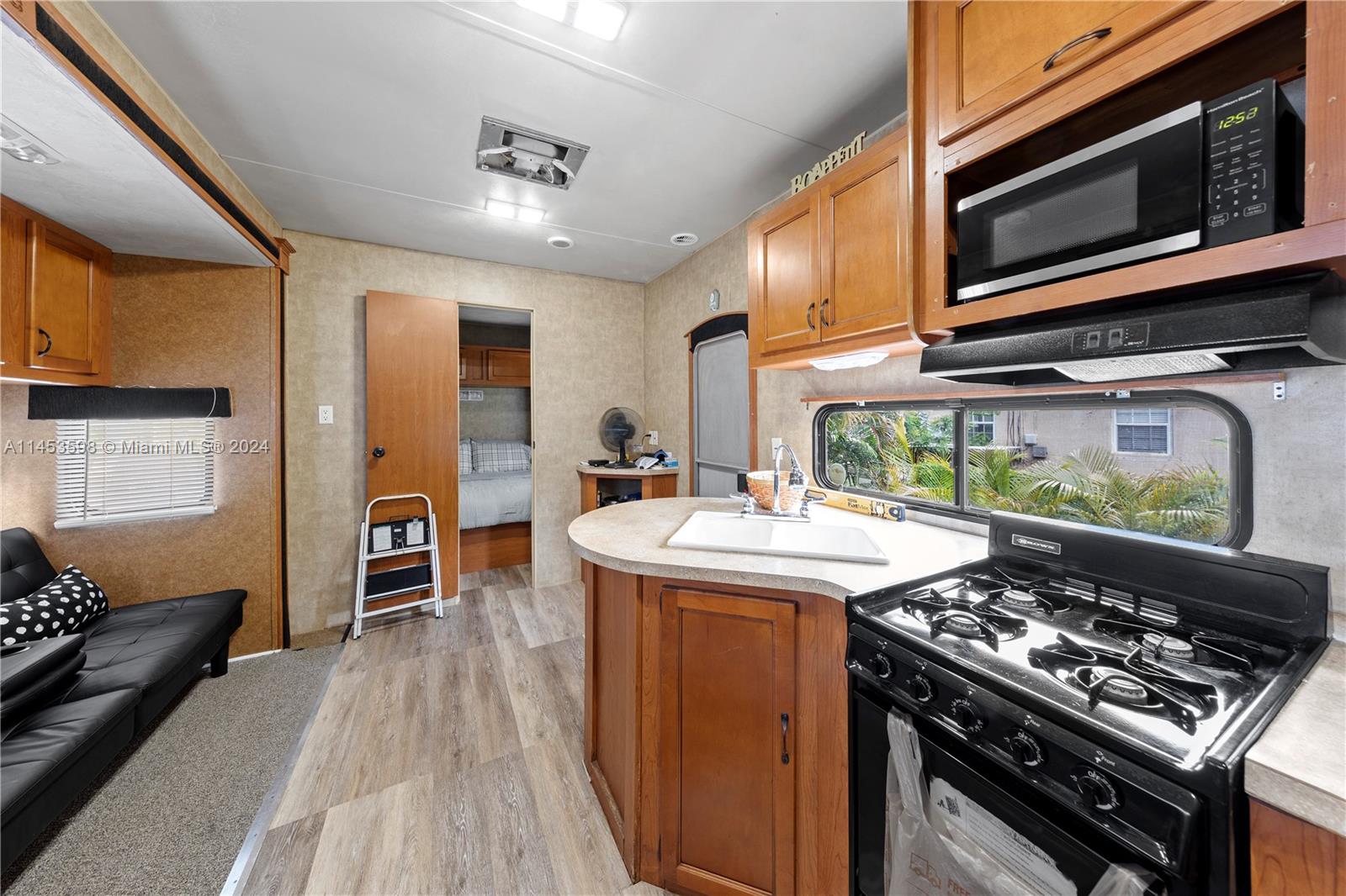 RV KITCHEN LIOVING AREA WITH SPLIT BEDROOM PLAN CONNECTED TO ITS OWN SEPTIC.