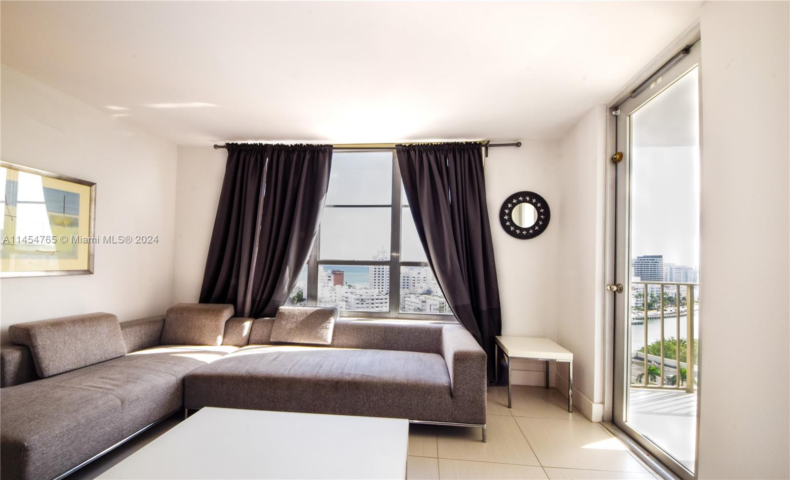 Living room with access to the large covered terrace.