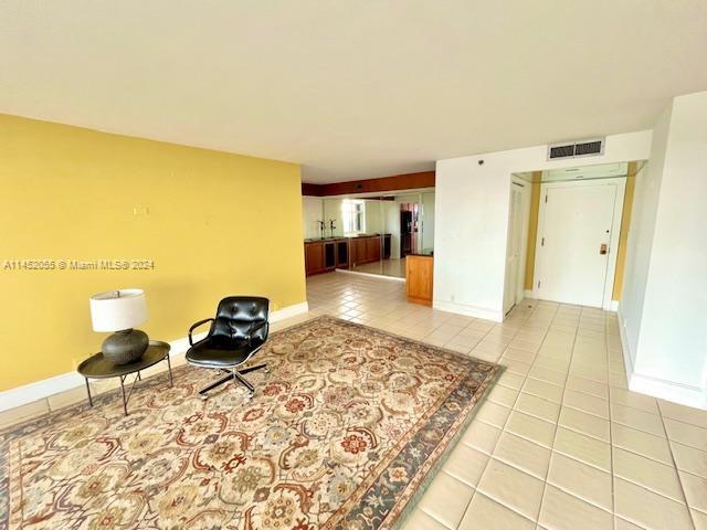 living room with view of dining area