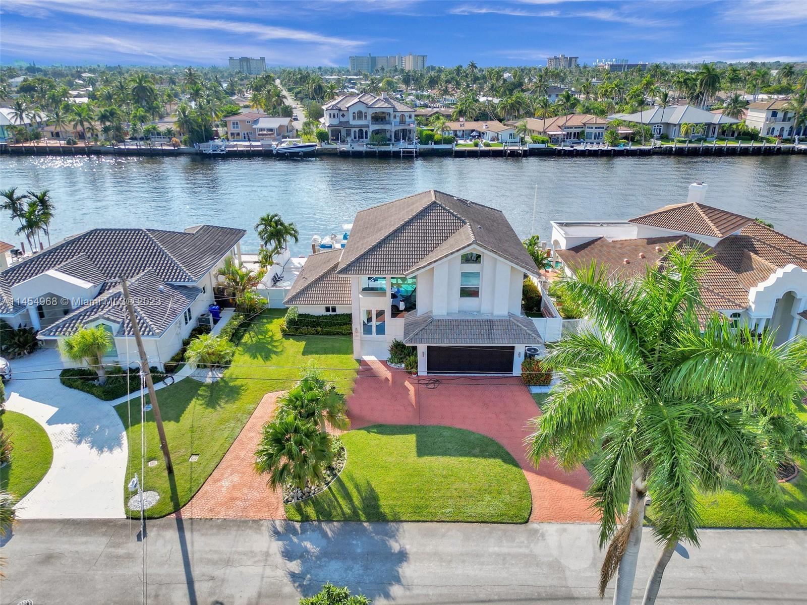 Welcome to Terra Mar, your private slice of paradise. This waterfront gem offers stunning Intracoastal views and grand, airy spaces. Imagine lounging on a lavish patio, pool drink in hand, making every moment unforgettable. Your boat's secure here, thanks to top-notch seawall and dock facilities. Wander over to Lauderdale by the Sea for unique shops, oceanfront eats, and that cozy fishing pier vibe. Inside, find two master suites offering serene escapes on each level. The kitchen? A chef's dream with a Steam Oven, ready for your culinary adventures. Revamped in 2018, this home is for those who live for luxury. It's more than an address; it's a lifestyle. Ready for the full story? Contact Minerva Strum today.