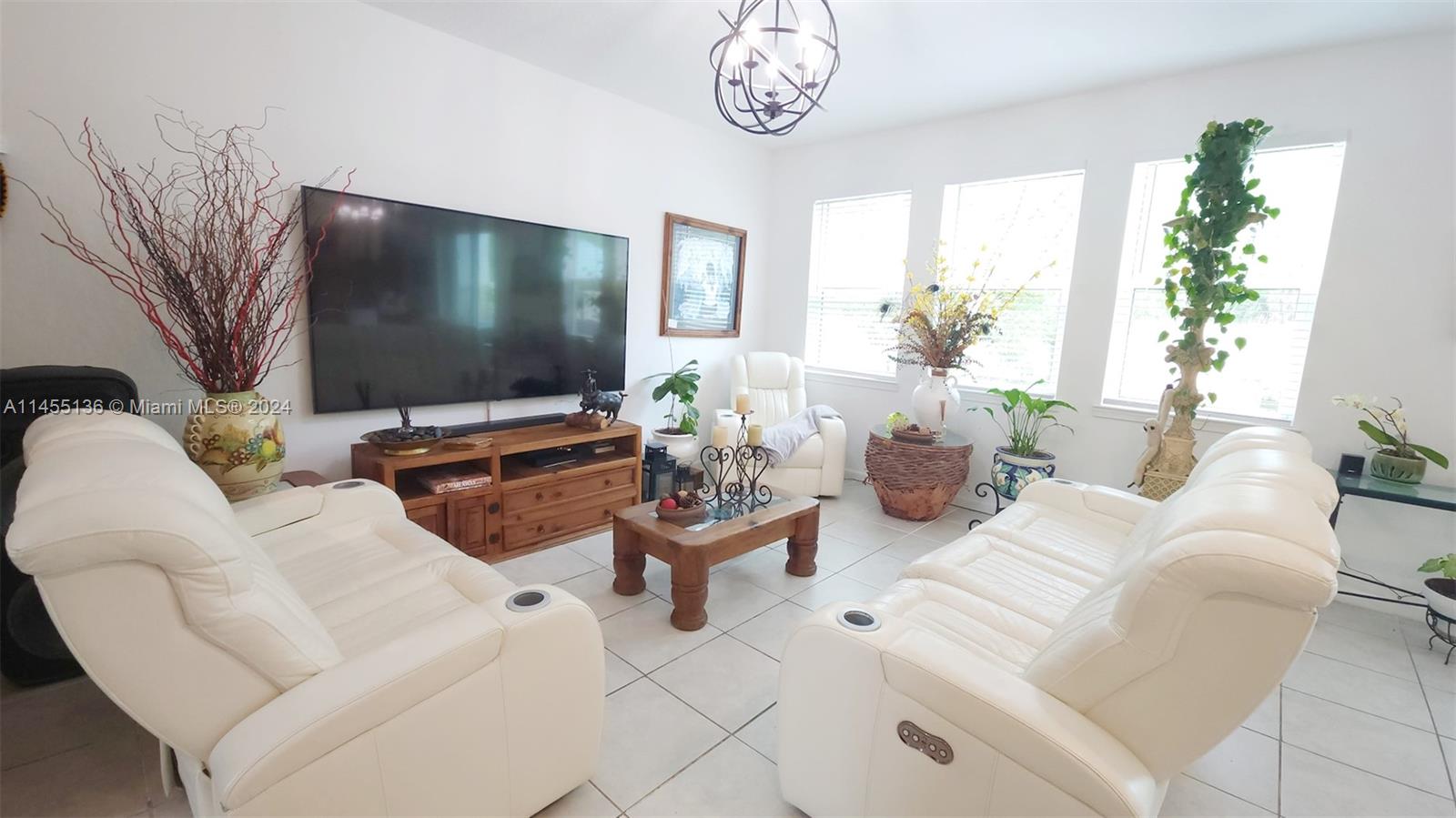 Step inside to a bright and inviting living space that effortlessly flows into the dining area.