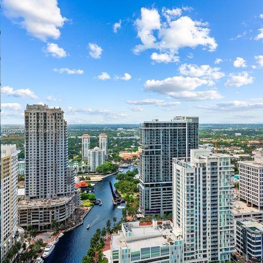 Remarkable Fifth Ave floor plan offering 3400 sq ft on the 37th floor in Las Olas River House, Ft Lauderdale's landmark tower. This stunning residence is a knockout in every way! Large open floor plan offers numerous entertaining areas. Flow thru design with magnificent views of the ocean, city skyline & dynamic New River from every room. Elevators sweep you to your private foyer with custom doors, calming palette thru out & numerous upgrades. This gorgeous condo features 3/3.5 with large bright kitchen, floor to ceiling glass & split bedrooms for privacy. Excellent parking spot with EV charging station. The building provides a luxury walkable urban lifestyle. Epic lobby with Koi pond, world class fitness center & tropical pool deck. Restaurants, shops & grocery store just steps away. Wow!