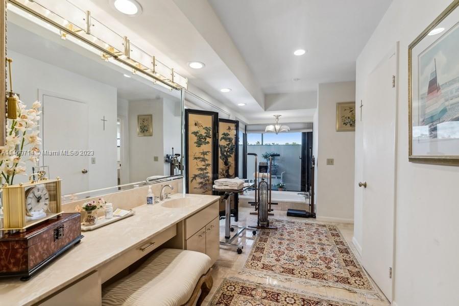 Here are the 2 walk-in closets, the Roman Tub and the 