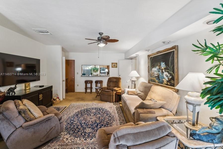 The view of the Familyroom looking towards the kitchen and the pass thru bar counter!