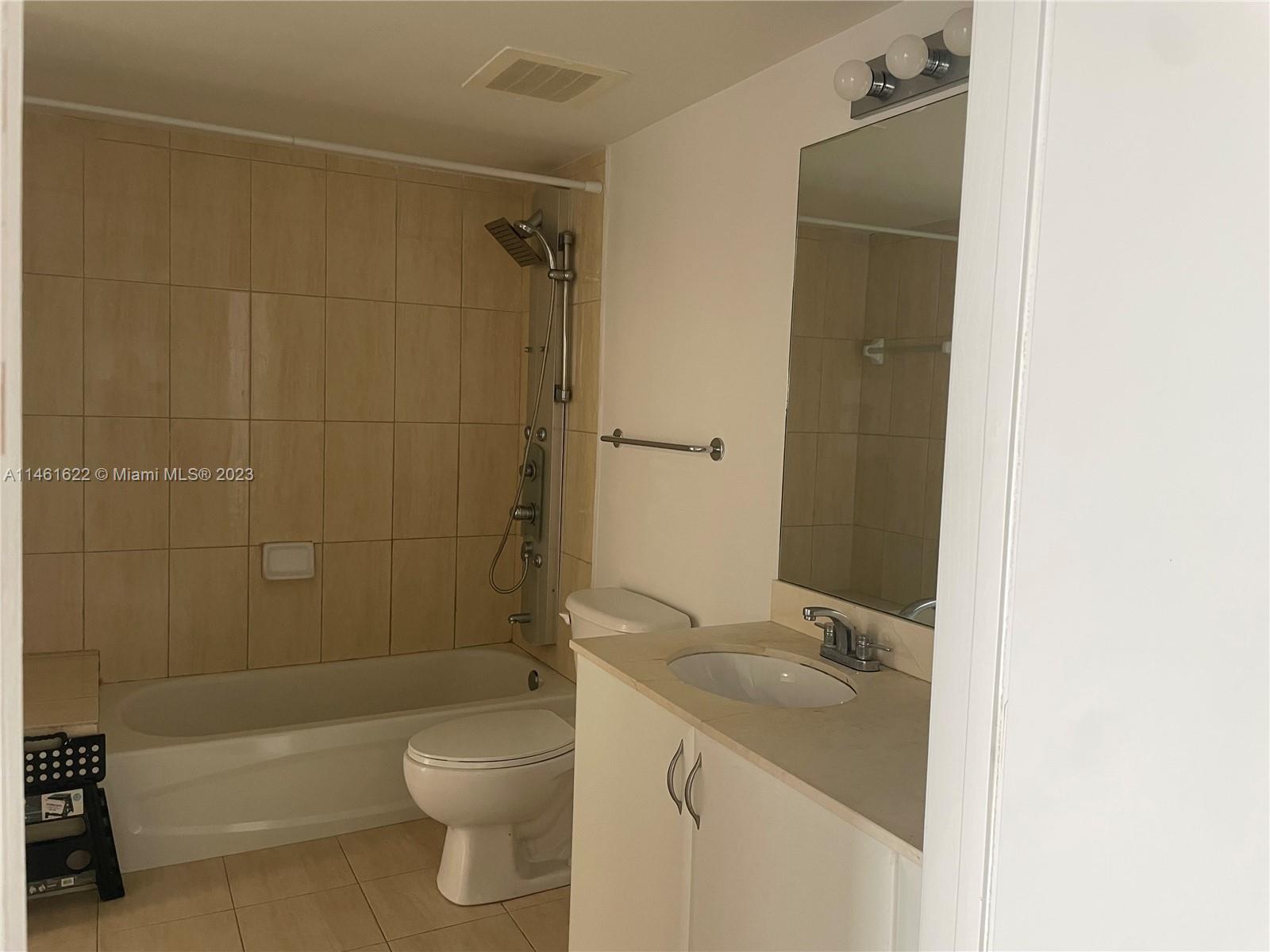 Bathroom with bathtub.