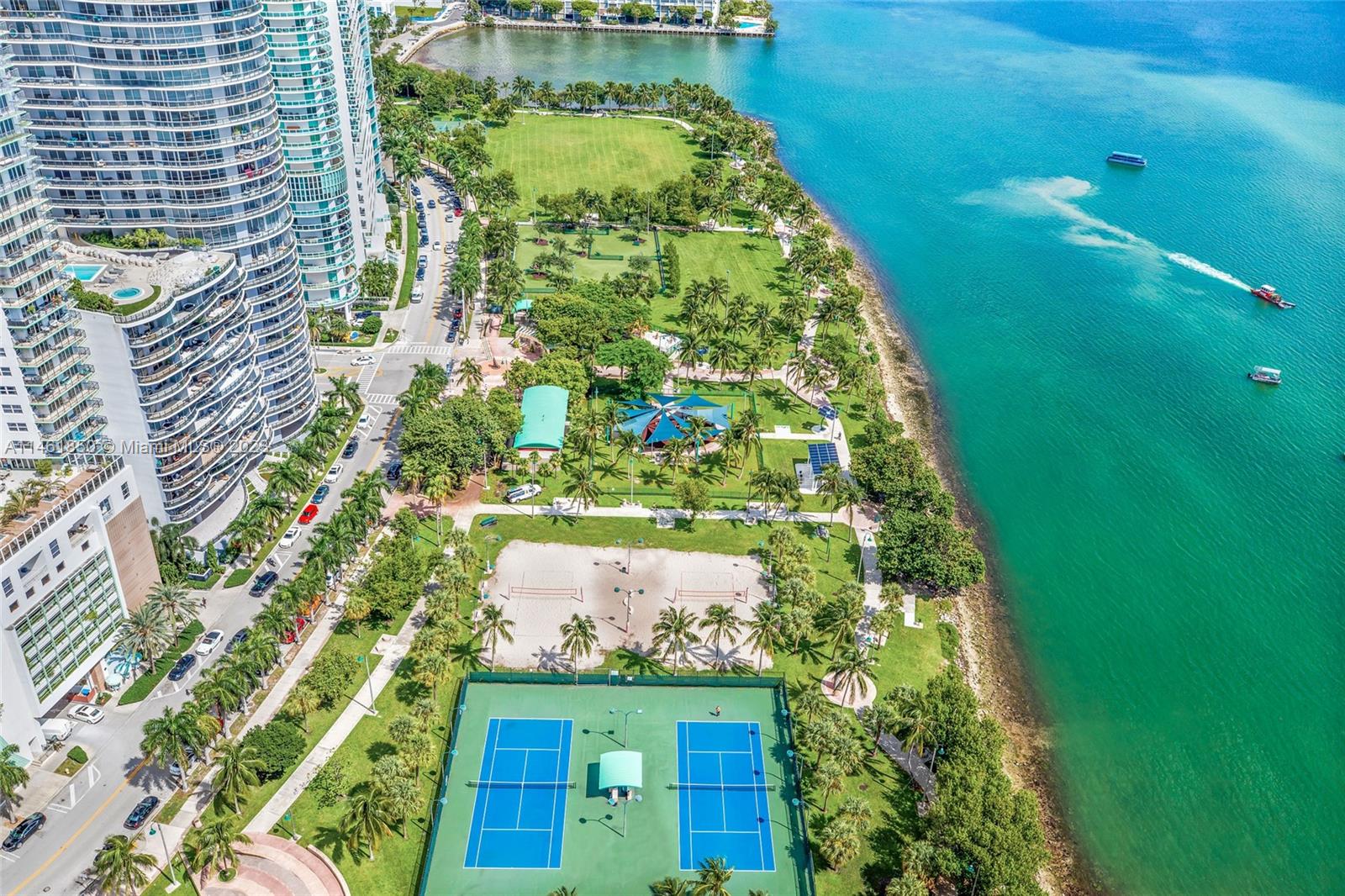 Grand opportunity with lowest price per Sqft in Edgewater and on the water! Grand Location, Views, Services, Retail, Grills, Bars, Pool, Sauna, Gym & more. Make your life Grand!  The Grand is near all; free trolley, free metro, train, busses and boats. Rent it 12x per year or daily in the Hilton Hotel program. 1602 SqFt. Travertine Floors indoor and out. Great Bay views and overlooks Margaret Pace Park (2 Tennis and 2 Volleyball courts, 1 full size Basketball court, Dog Run, Kids playground and a Gym area). Steps to Publix & Wells Fargo. etc..