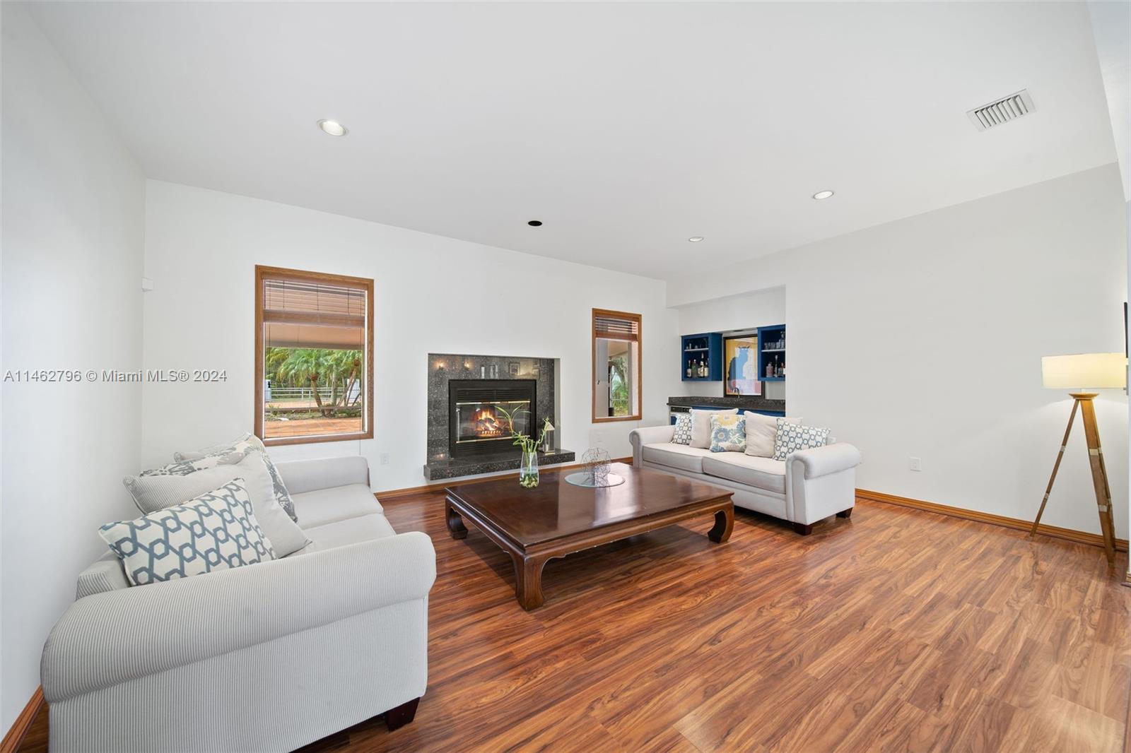 Living Room - Beautiful living room with bar and fire place