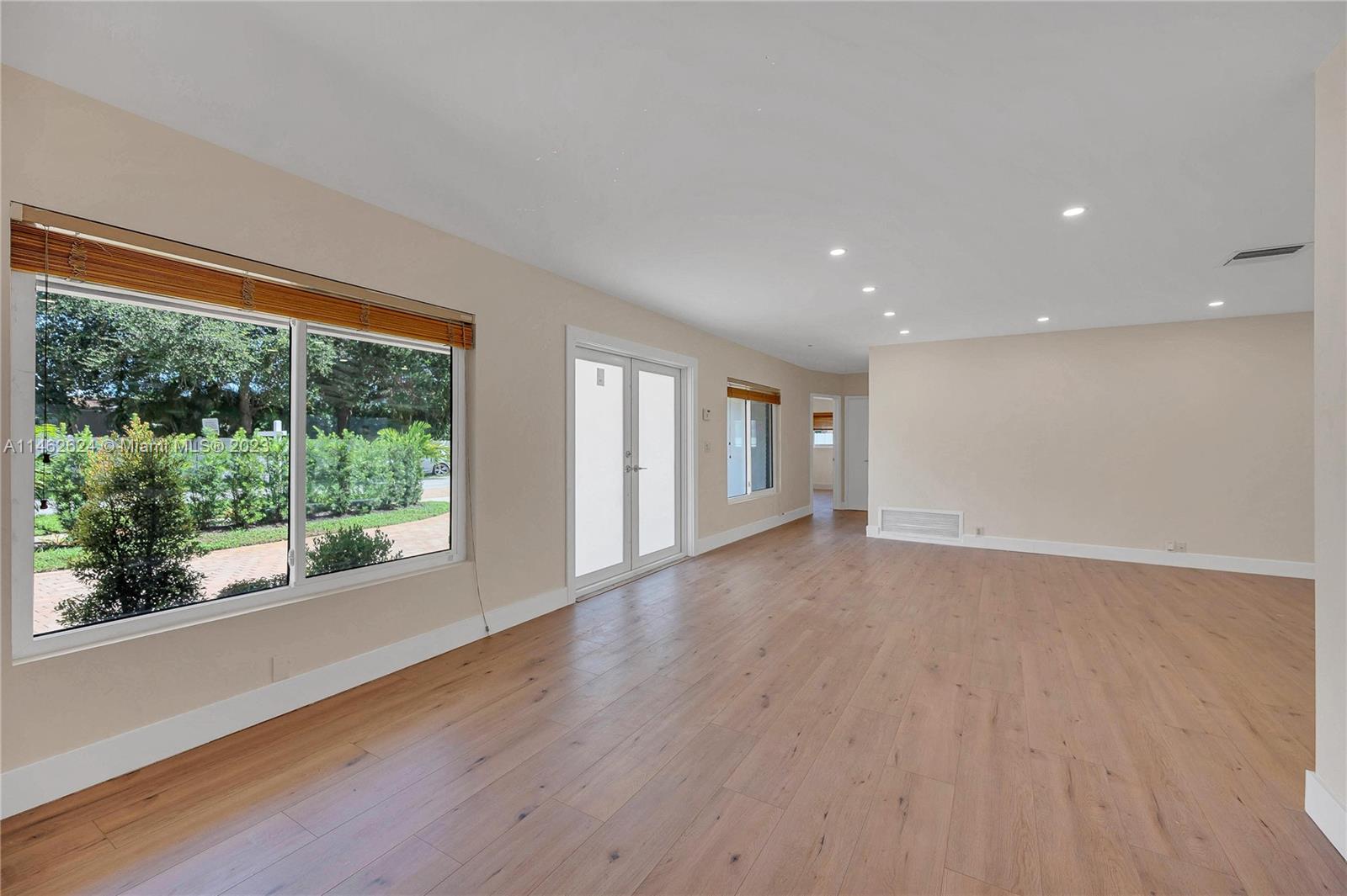 Front double door entrance & wood floors throughout.