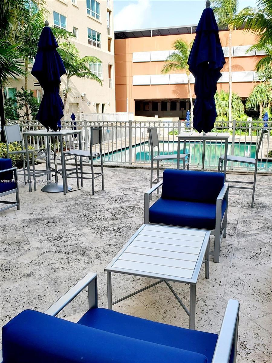 Lots of lounge and sitting areas around the pool deck.