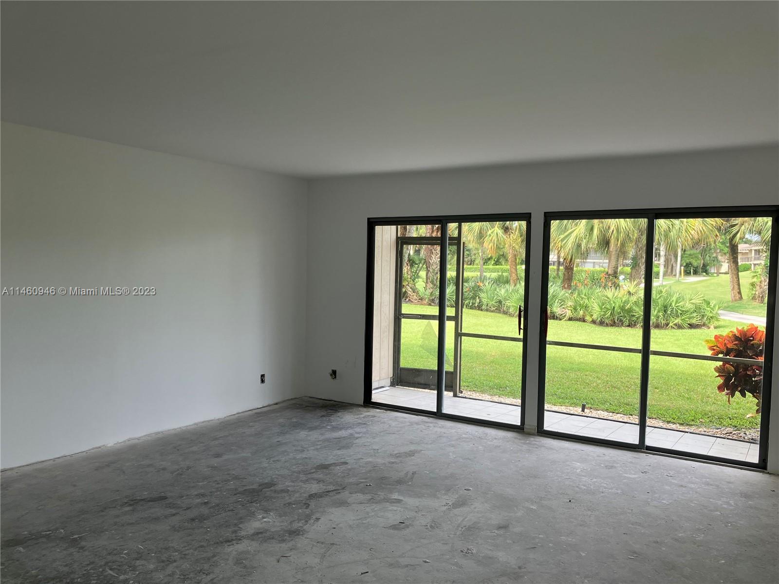 Spacious , bright living room open to screen porch