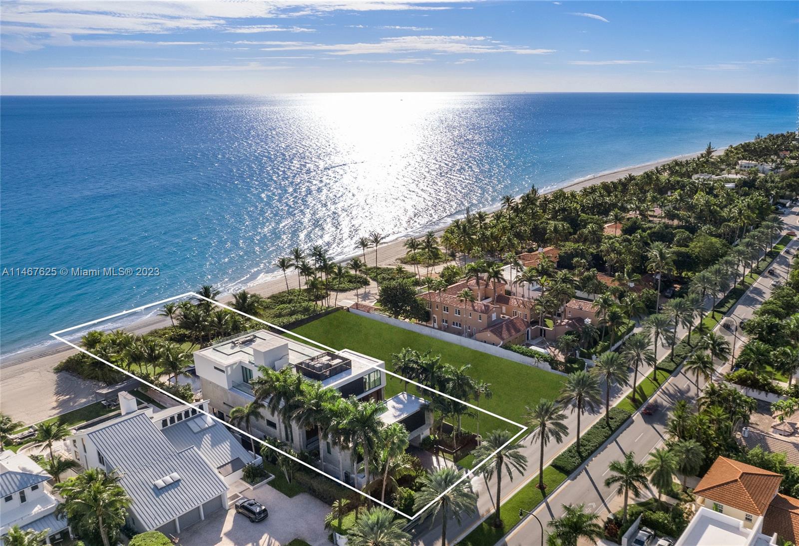 Spectacular oceanfront mansion in exclusive Golden Beach, situated directly on the Atlantic Ocean! This luxurious, 3-story, 12,000-SF home is sprawled on a 20,925-SF lot with 75-FT of pristine beach as your backyard! Here, ocean views can be enjoyed from everywhere, including the huge rooftop on the 4th level! Lavish living areas with wet bar, gourmet kitchen, elegant dining room, and a deep terrace flawlessly interconnect creating ideal spaces for indoor/outdoor entertaining. The home has 9 beds and 13 baths, including a lavish master suite with a sitting area, hers/his marble baths, walk-in closets, and a private terrace. Ground level has a theater, recreation area, staff room. Amenities: elevator, 2 summer kitchens, detached guesthouse, and incredible backyard with a pool, spa cabana!