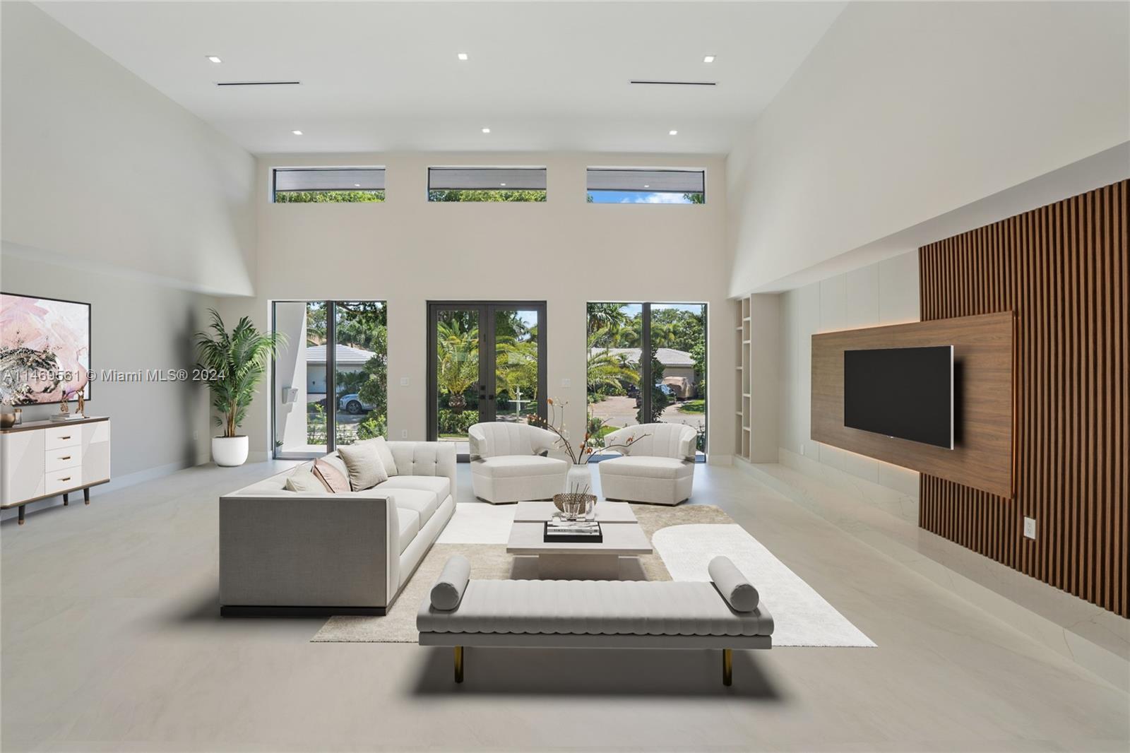 Open floor Plan, 15 ft Volume Ceilings, South-Facing Impact windows and doors,48x48 porcelain floors.