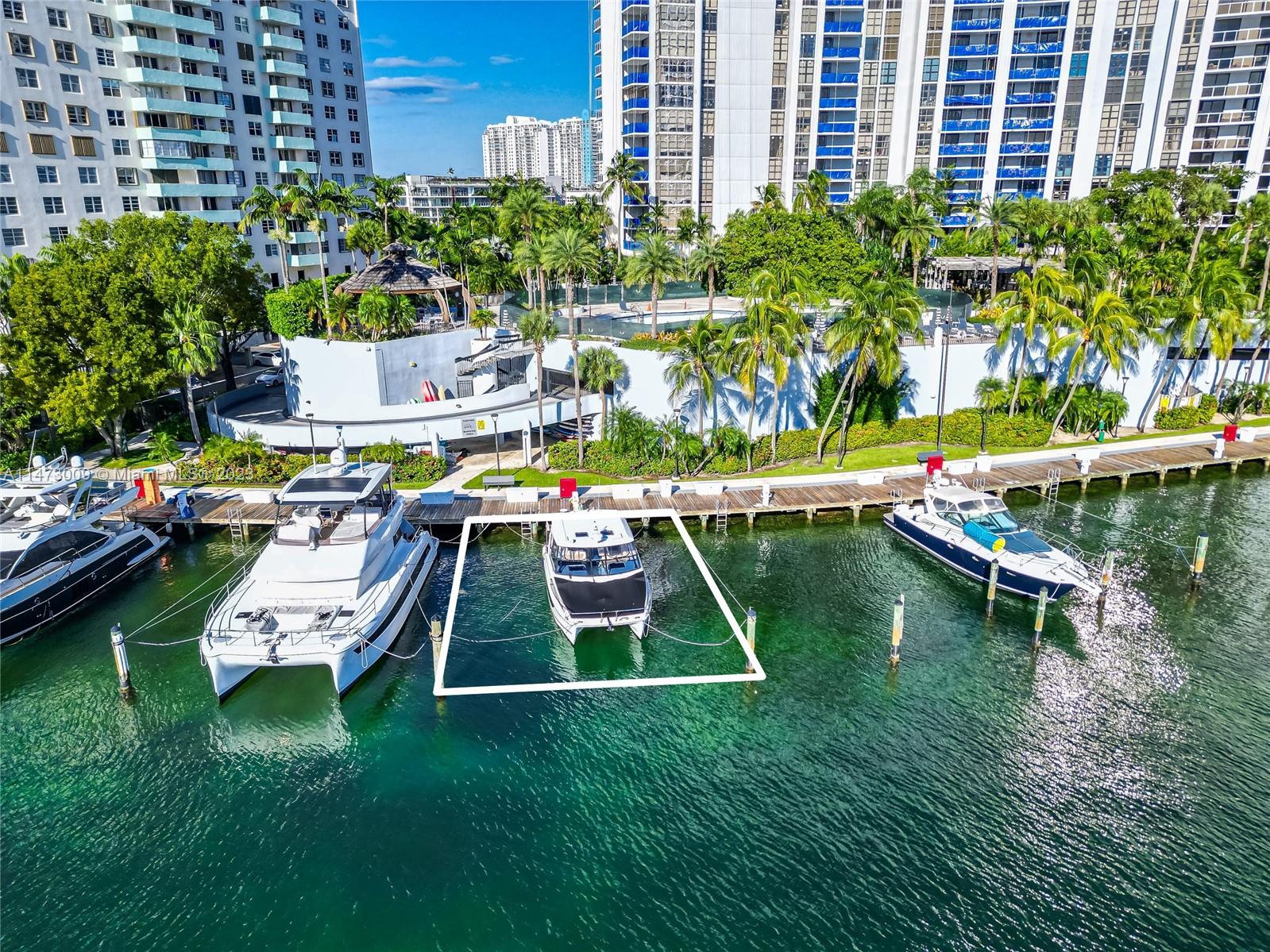 UNIT COMES WITH TWO BOAT SLIPS. Designed by renowned New York interior designer Robert Passal, this rare two-bedroom, two-bathroom unit boasting nearly 1,500sf includes an in-unit sauna, additional storage room, and two boat slips making this a boaters dream. Resort style amenities include a heated bayfront pool with spa, fitness center, yoga room, business center, party room, kids playroom, restaurant, BBQ area, tennis courts, 24hr security, and valet parking. Close to Belle Isle Park, Lincoln Road, Sunset Harbour, The Standard hotel and spa , Trader Joe's, dining, shopping, top schools, medical center, airport, & beaches.