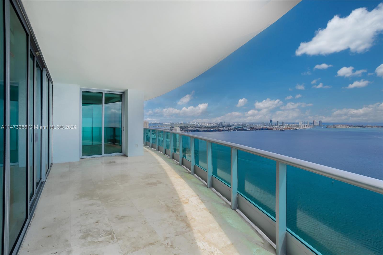 The wait is over for the most sought-after, high floor 11-line corner unit occupying the rarely available south end at Jade Brickell. Perched on the 40th floor, this flow through unit provides unobstructed, forever panoramic views of the mesmerizing turquoise waters of Biscayne Bay & Atlantic Ocean. Southern exposure provides natural sunlight in every room. This exceptional property boasts over 3,400+ interior SF, offering a spacious & luxurious living experience. With 4 bedrooms plus maid's quarter, 4.5 bathrooms, & 3 separate terraces, it's the epitome of grandeur & comfort. Jade Brickell is the quintessential 5-star condominium. Enjoy a state-of-the-art fitness center, spa, two pools, & much more. The perfect waterfront location & walking distance to everything Brickell has to offer.