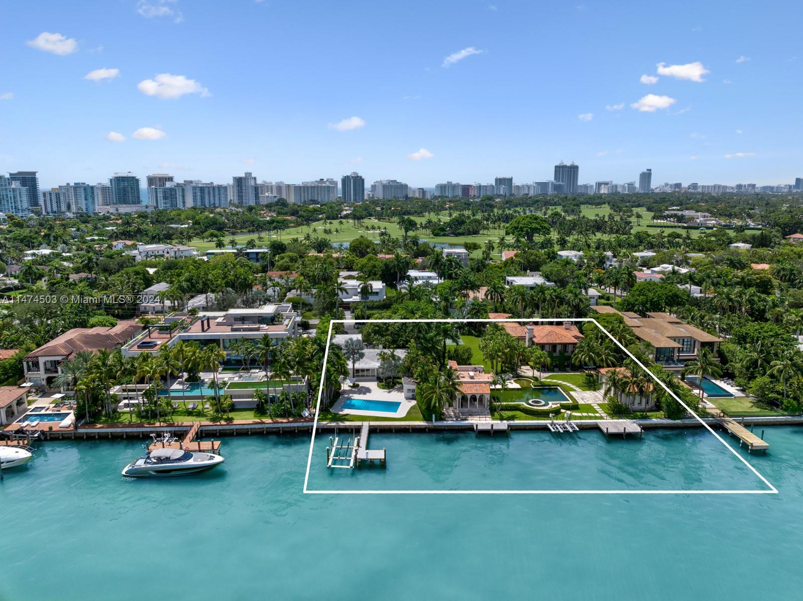 Embrace a rare opportunity on prestigious North Bay Road—a triple lot encompassing 63,376 SF with a total of 245 (+/-) feet of prime waterfront. This unique property combines 170' at 6020-6030 North Bay Rd w/ an additional 75' at 6050 North Bay Rd. Enjoy captivating open bay views from the beautifully livable 12,700 SF (+/-) residence, which can also be leased to generate income while you craft your vision for a dream home. Ideal for the avid boater or yachtsman w/ 3 docks included. A canvas for your aspirations, offering endless possibilities & the chance to create your ideal waterfront sanctuary. Make the most of this rare opportunity to own a piece of North Bay Road's renowned waterfront and bring your vision to life. Property may be sold w/ DRB approved plans by world renown architect.