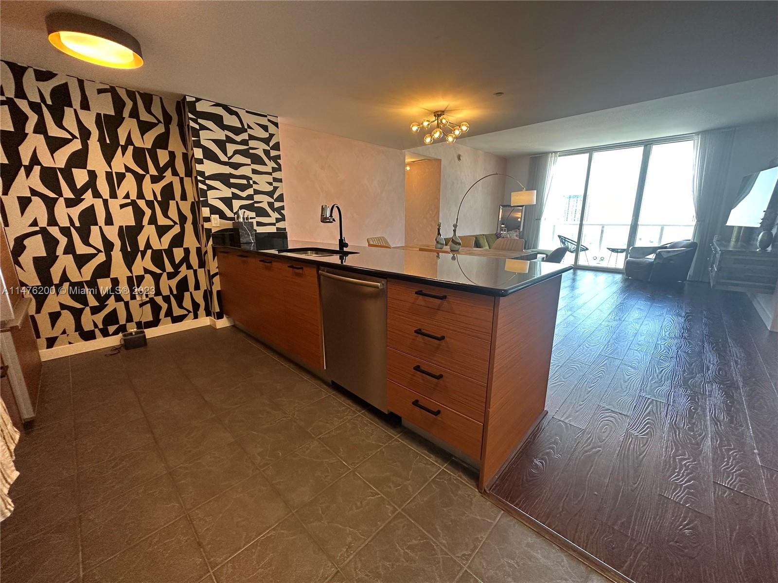 Beautiful high floor 2 bedroom, 2 bathroom corner unit with floor to ceilings windows and a wrap around balcony. Views of Biscayne bay and the city. The kitchen offers granite countertops, stainless steel appliances, and plenty of cabinet space. A great location to live, walking distance to Whole Foods Market and many restaurants. Close to the beaches and Miami international airport. Unit is available furnished or not furnished. Please call the listing agent for showings.