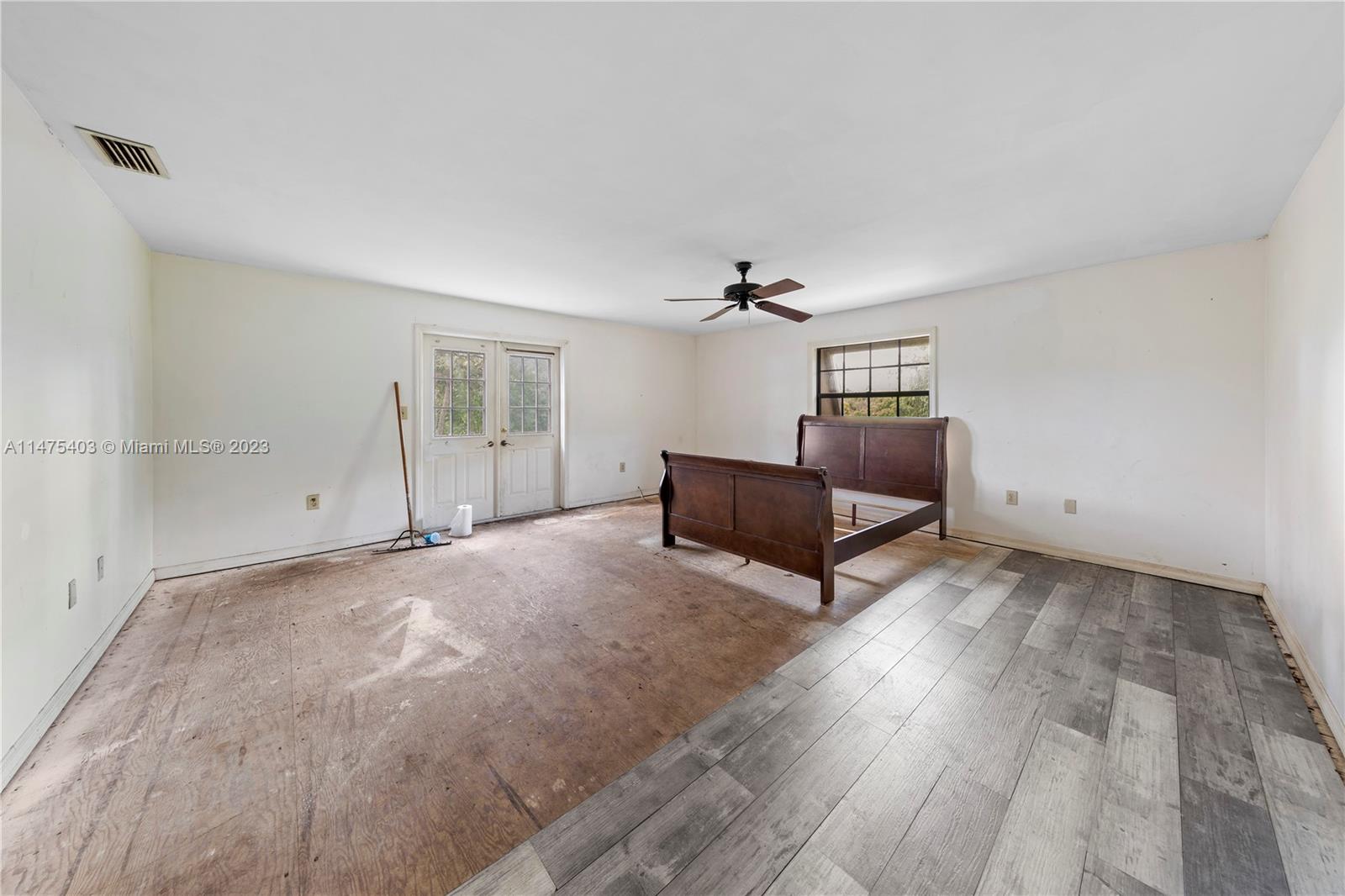 HUGE SPACE OPENS TO BALCONY.. FLOORING AND PAINT REQUIRED
