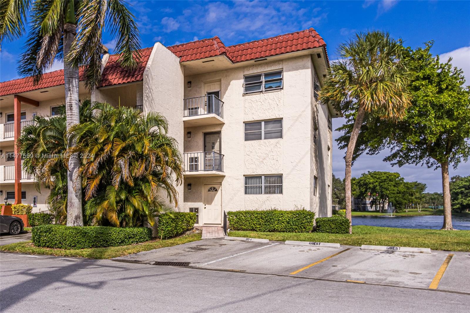 First floor corner unit with assigned parking