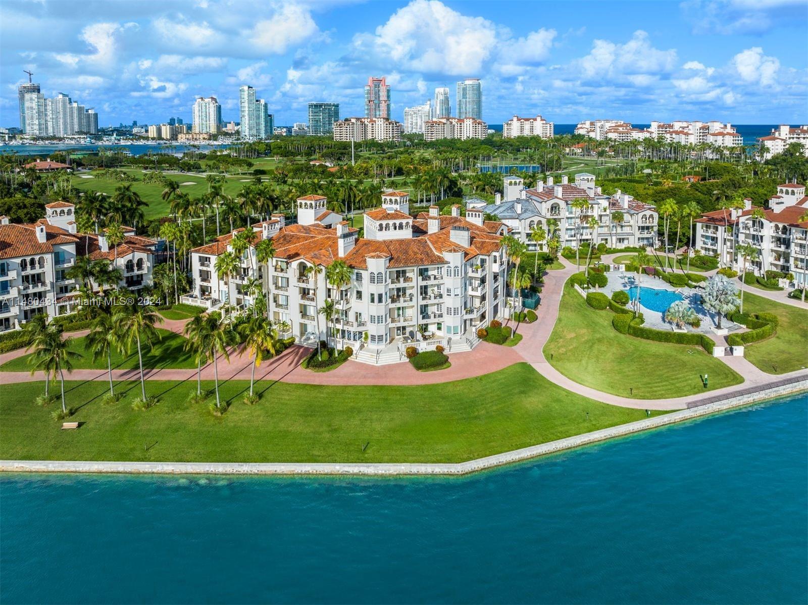 Discover unparalleled value on Fisher Island! This spacious 2BR+den (or 3rd BR option) 2.5BA, 1912 SF residence features a double door entry, 2 balconies, and security system. Imagine your morning coffee from your terrace overlooking stunning and breathtaking bay, ocean, and pool views.  Come inside to a great layout featuring split plan bedrooms for privacy, a remodeled kitchen, wood/marble floors and a generous primary suite with spacious closets and a bathroom featuring dual vanities and soaking tub. Sale of property includes 2 garage + 1 golf cart parking space + oversized storage unit.  Equity membership not required with this purchase.  Pet friendly and you can rent the unit 1x a year no minimum amount of time.  Sellers prefers showings during the week after 2:30 pm.